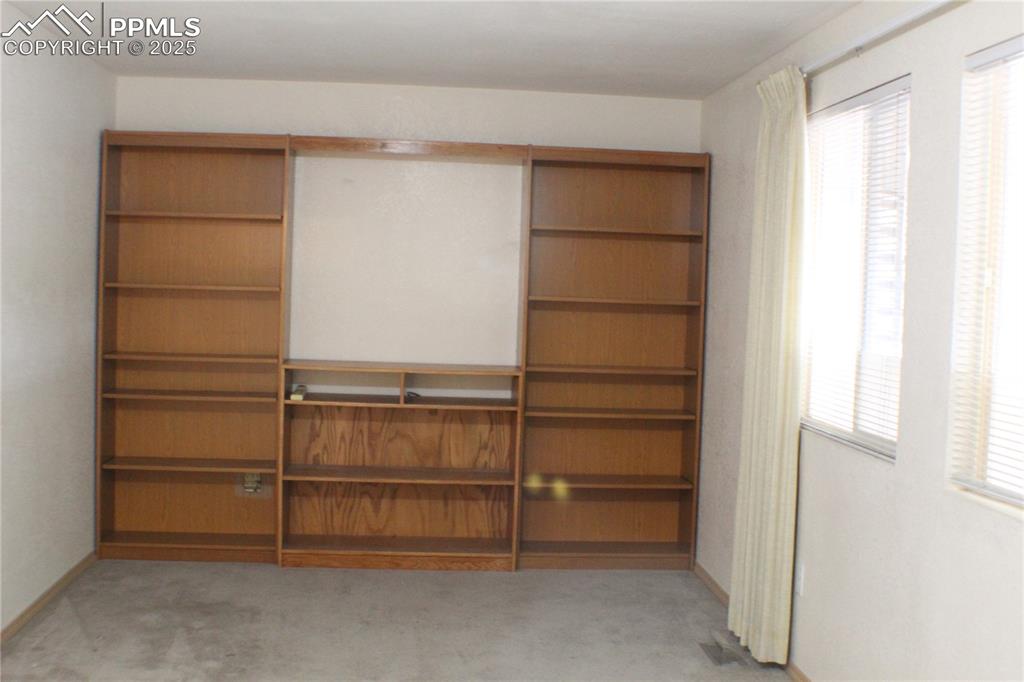 4706 Pioneer Road Pueblo, CO 81008 - Photo 13 of 23 a view of an empty walk in closet