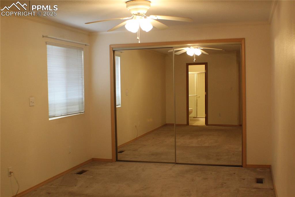 4706 Pioneer Road Pueblo, CO 81008 - Photo 6 of 23 an empty room with a bathroom