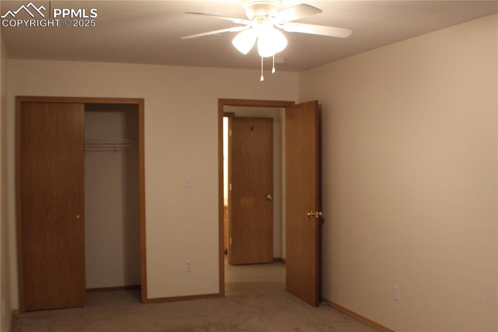 4706 Pioneer Road Pueblo, CO 81008 - Photo 10 of 23 an empty room with a bathroom