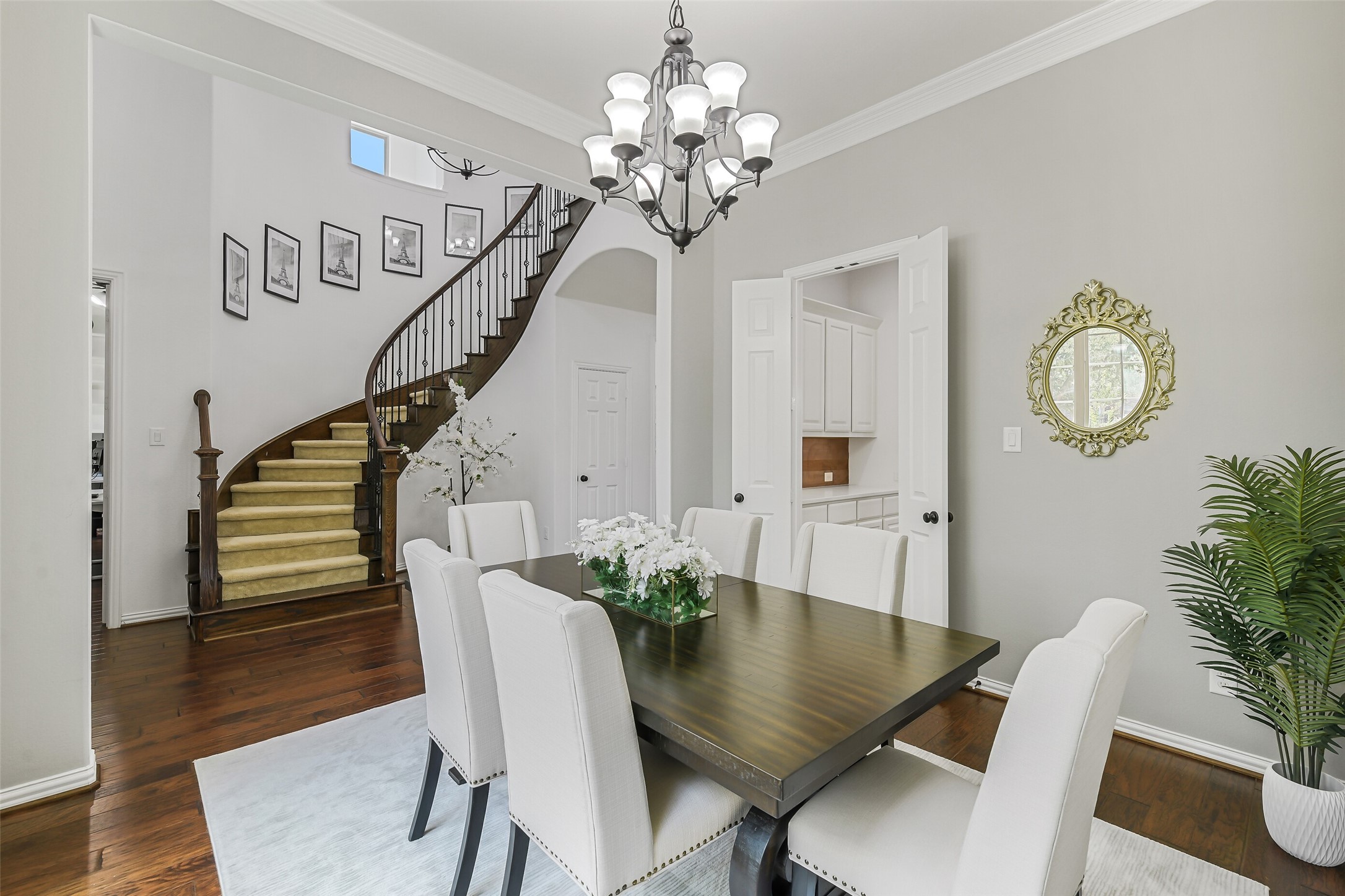 12207 Shorebridge Road Cypress, TX 77433 - Photo 5 of 41 a view of a dining room with furniture and wooden floor