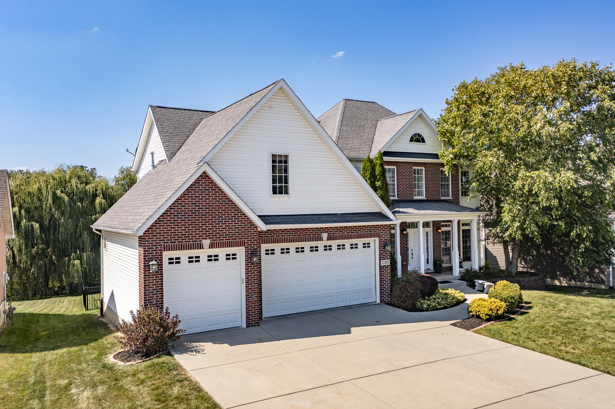 a front view of a house with a porch