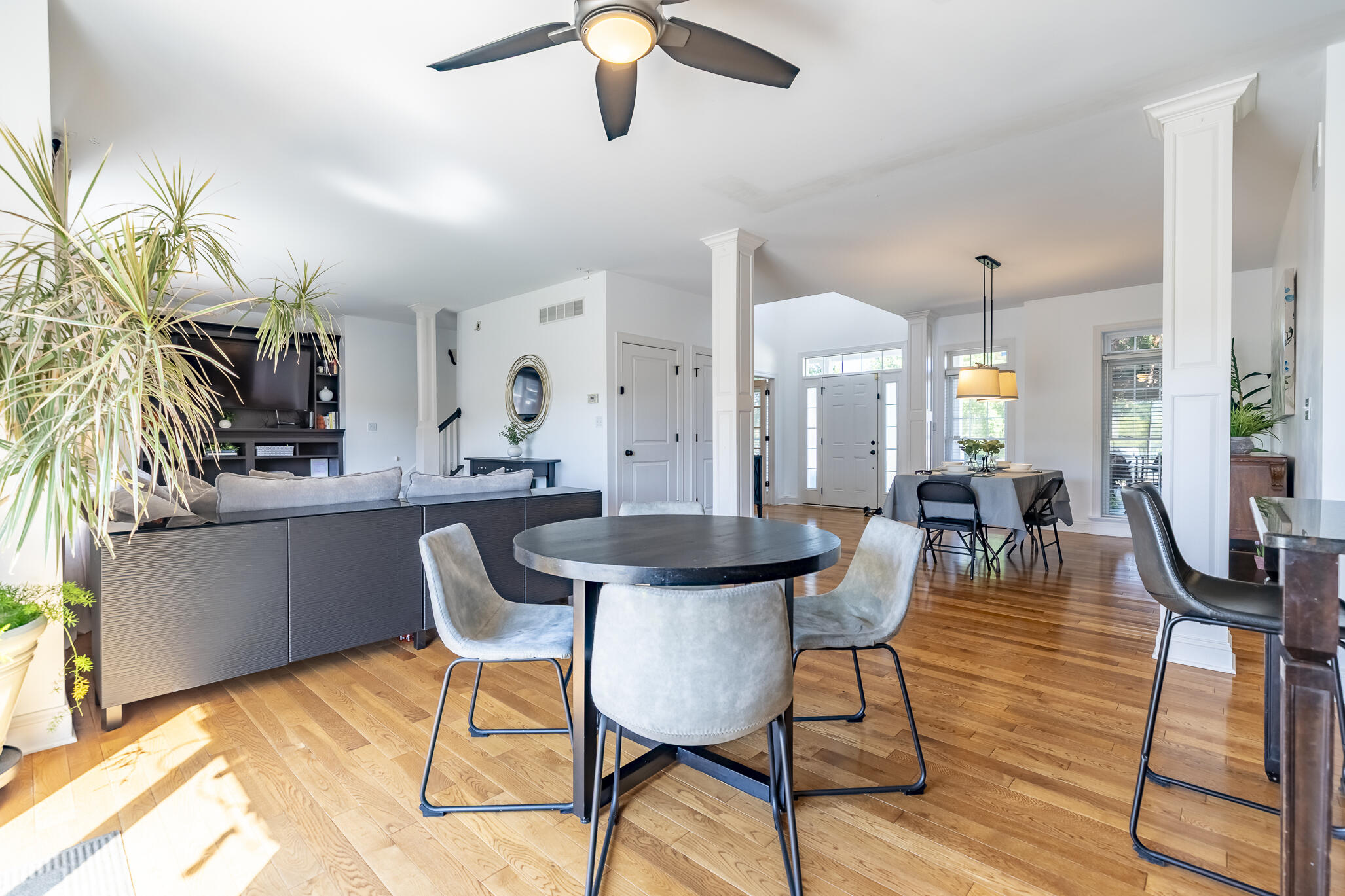 12492 Washington Street Crown Point, IN 46307 - Photo 14 of 43 a view of a dining room with furniture and a chandelier