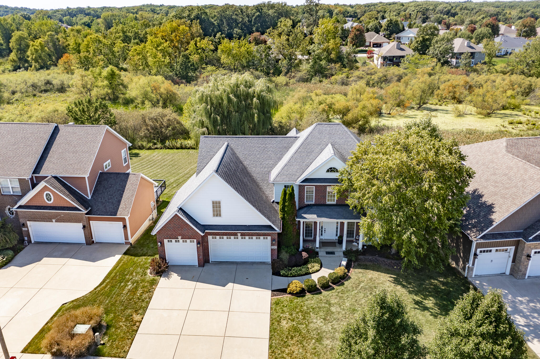 12492 Washington Street Crown Point, IN 46307 - Photo 41 of 43 an aerial view of a house having swimming pool