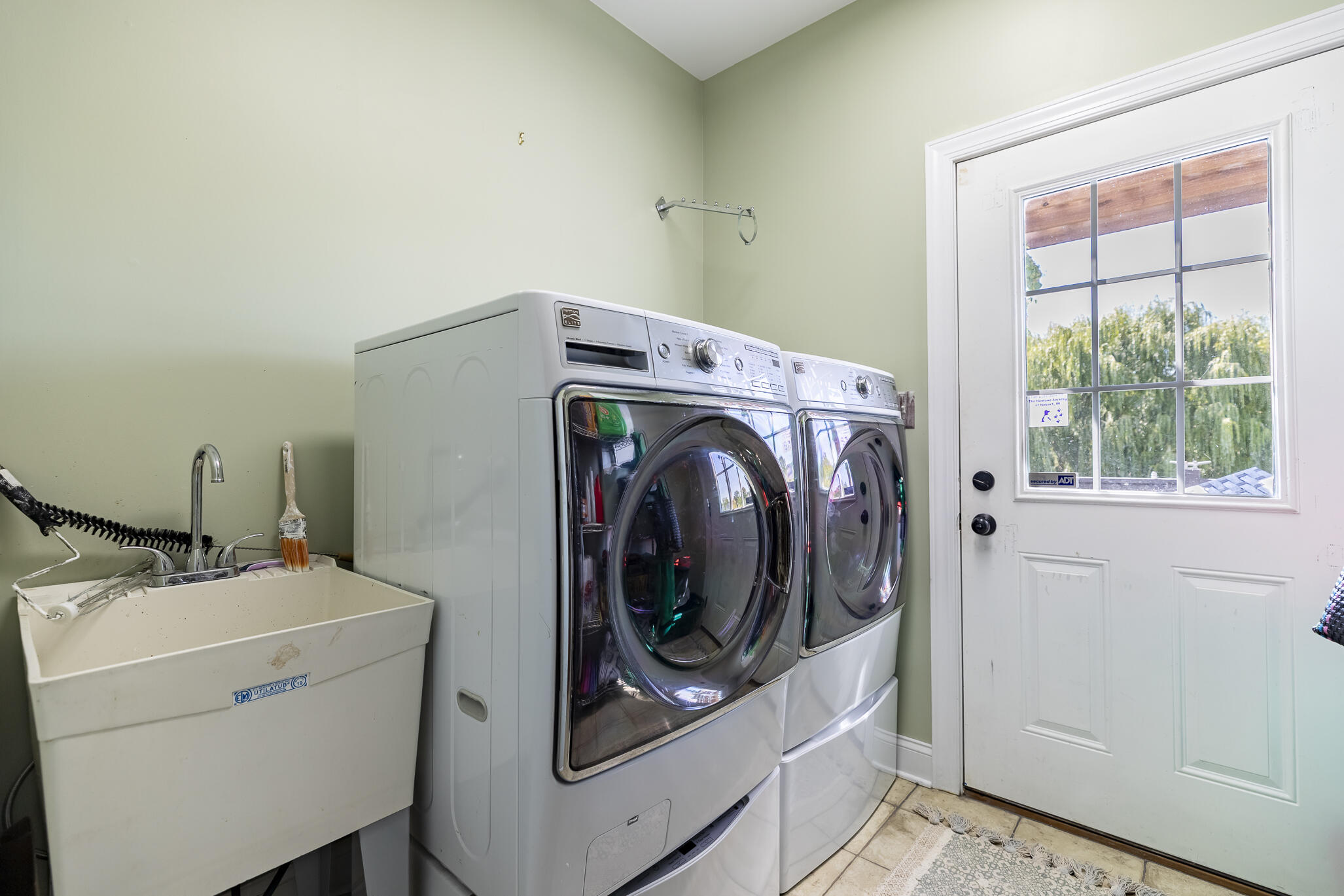 12492 Washington Street Crown Point, IN 46307 - Photo 42 of 43 a utility room with dryer and washer
