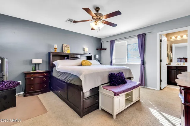 a kitchen with stainless steel appliances granite countertop a refrigerator stove a sink and a microwave