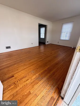 a view of an empty room and window