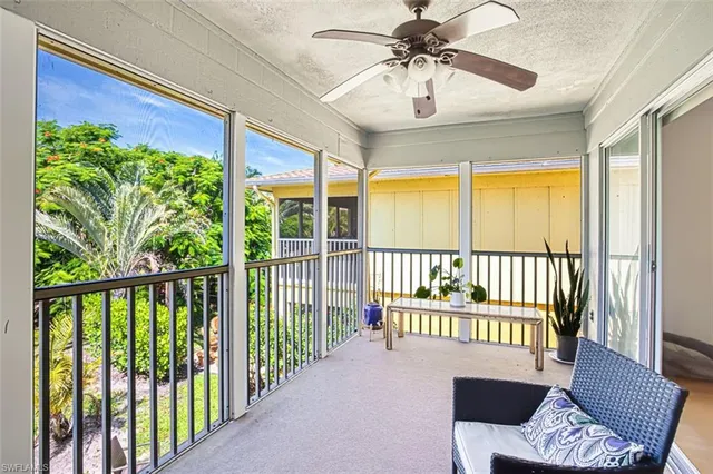 a view of a porch with furniture