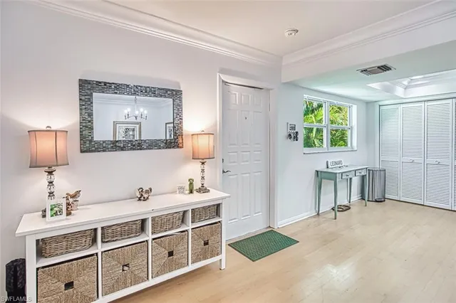 a spacious bathroom with a double vanity sink a mirror and a bathtub