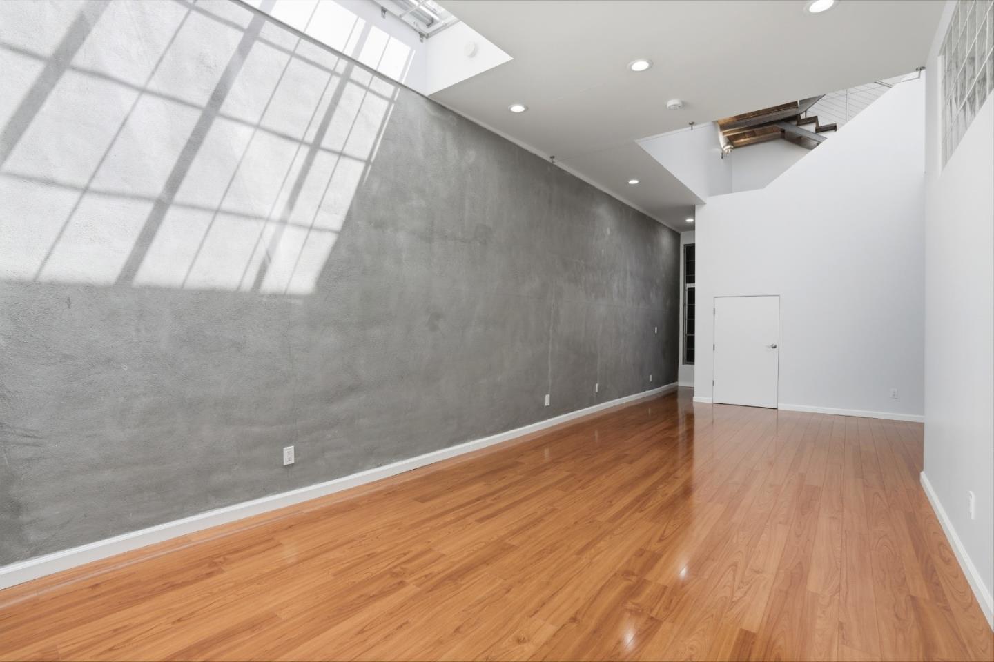 2709 Tenth Street, Unit C Berkeley, CA 94710 - Photo 10 of 44 a view of a room with wooden floor