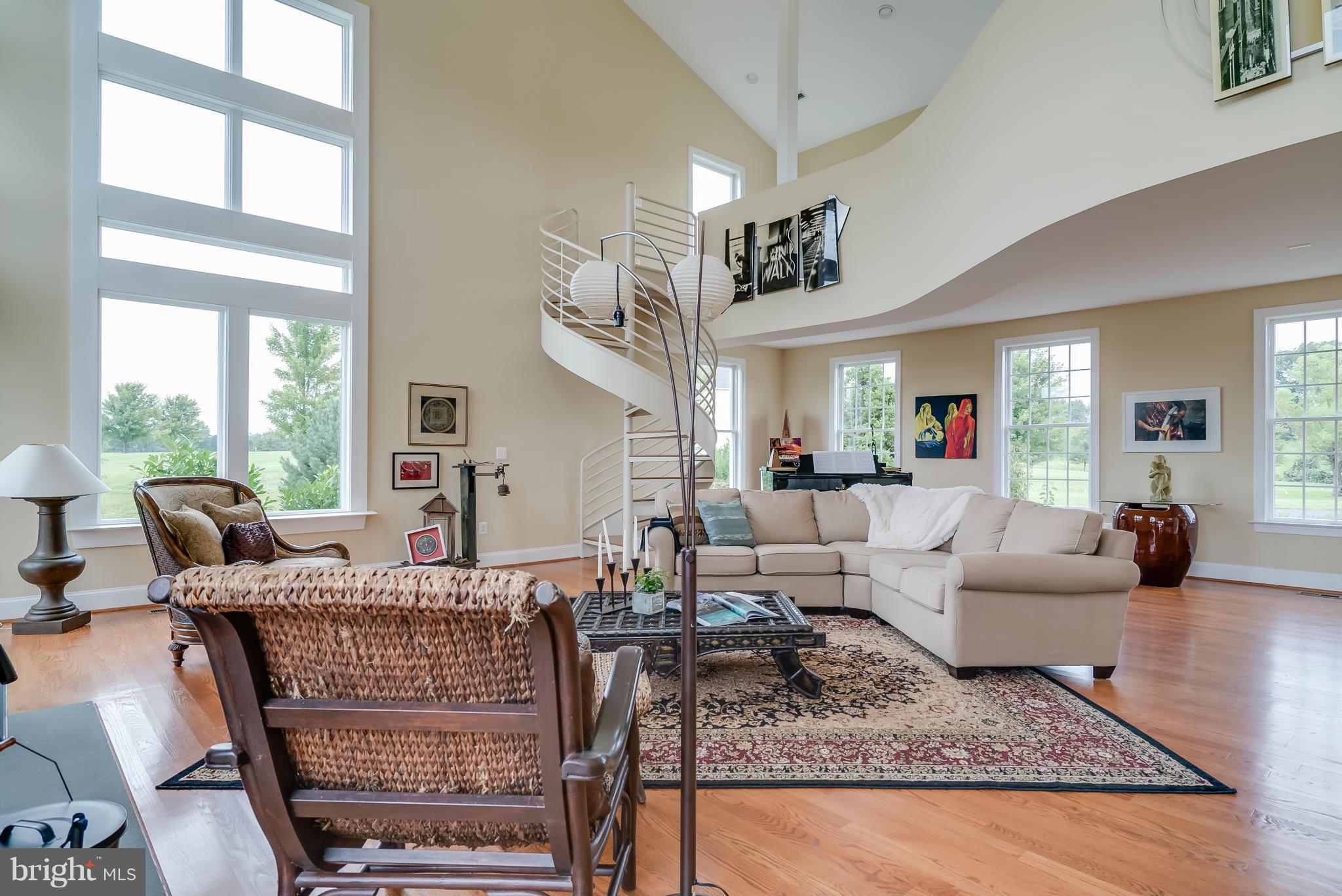 15657 Limestone School Road Leesburg, VA 20176 - Photo 8 of 30 Spiral staircase leads to loft, open to great room