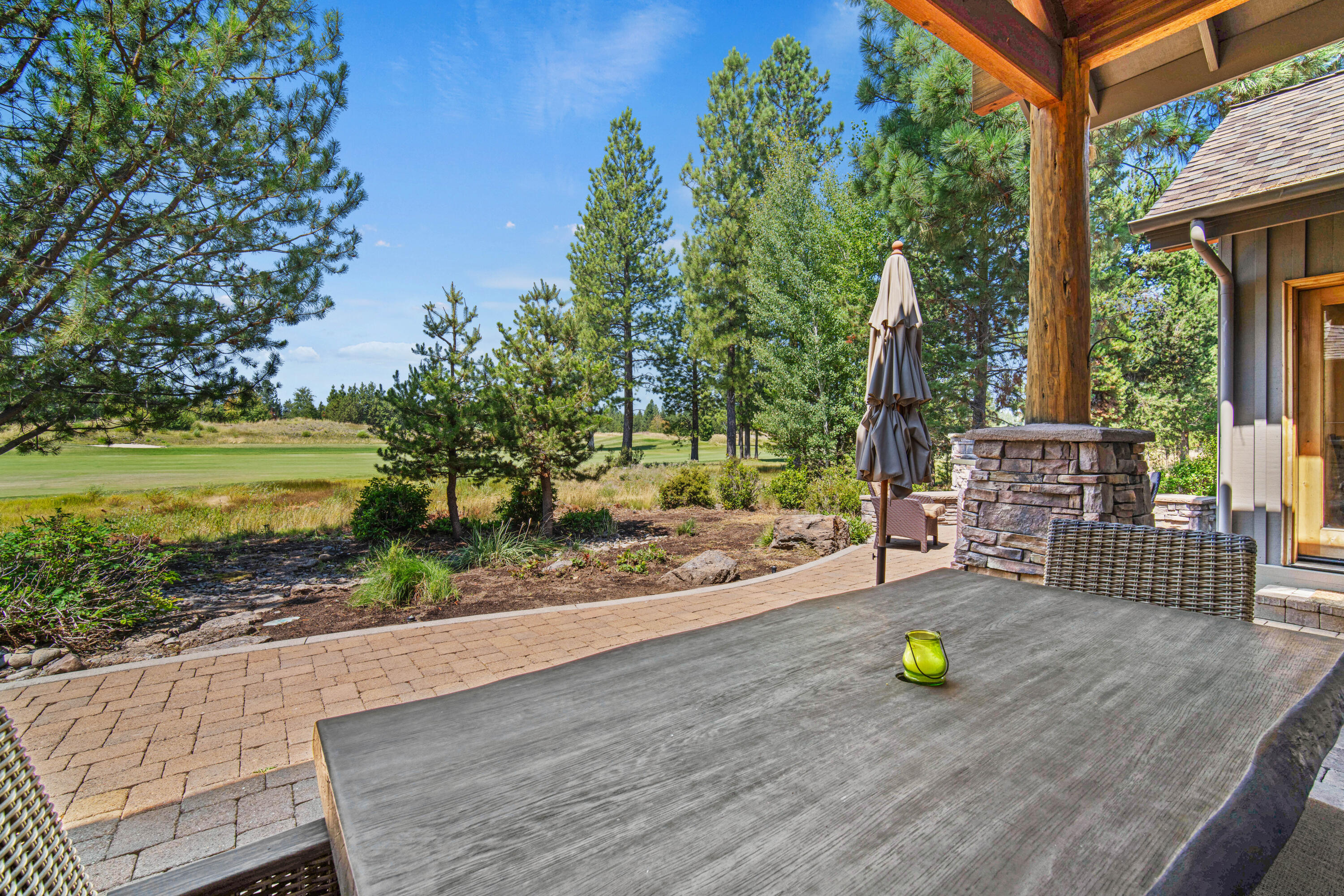56689 Dancing Rock Loop Bend, OR 97707 - Photo 43 of 51 a view of a sink and yard with wooden floor