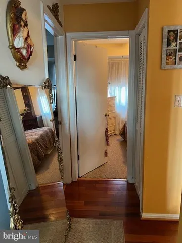 a living room with furniture rug and window