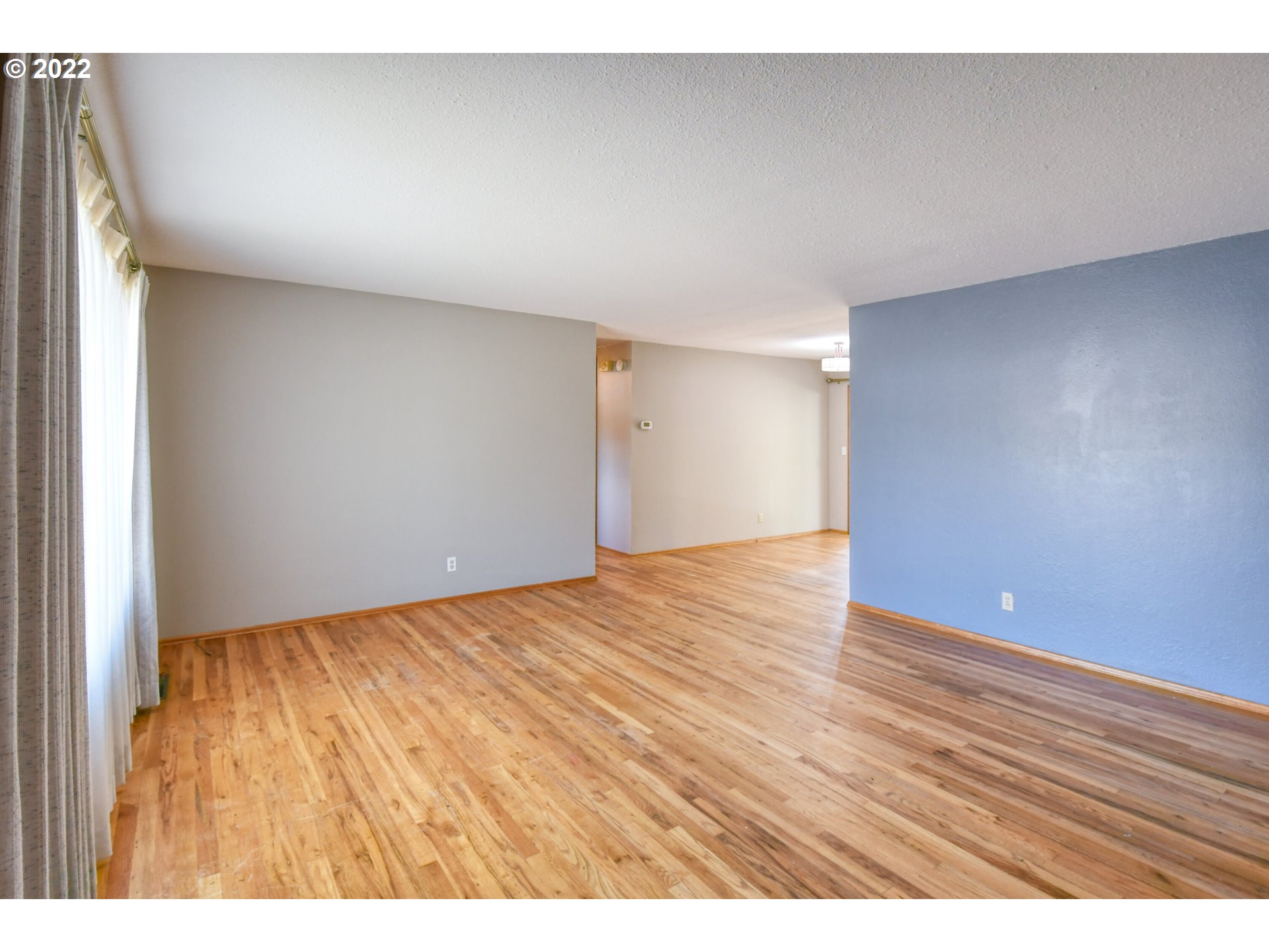 3231 Southwest Isaac Avenue Pendleton, OR 97801 - Photo 10 of 32 a view of an empty room and wooden floor