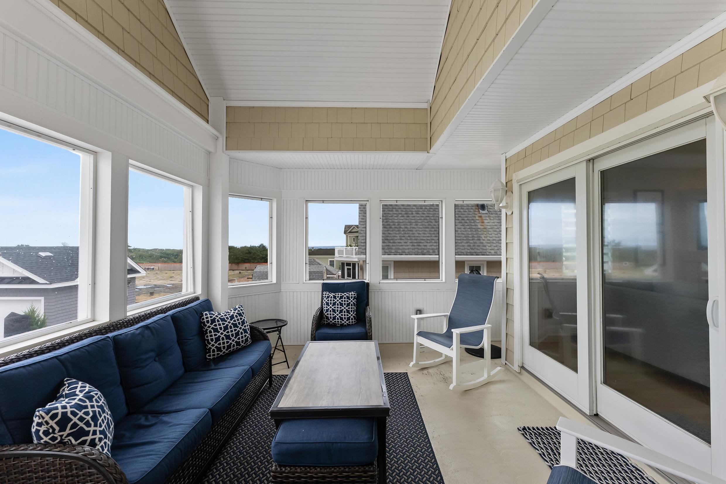 120 113th Street Stone Harbor, NJ 08247 - Photo 16 of 50 a living room with furniture and a large window