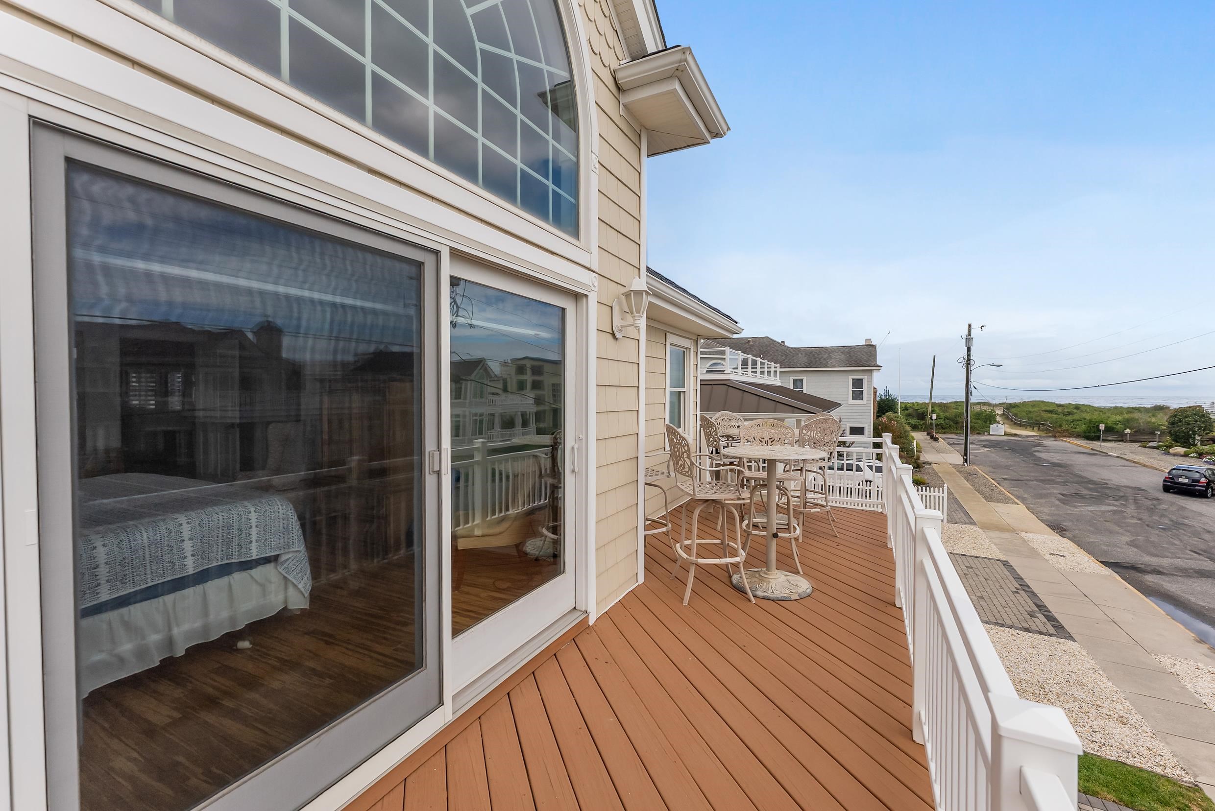 120 113th Street Stone Harbor, NJ 08247 - Photo 23 of 50 a view of a balcony with wooden floor