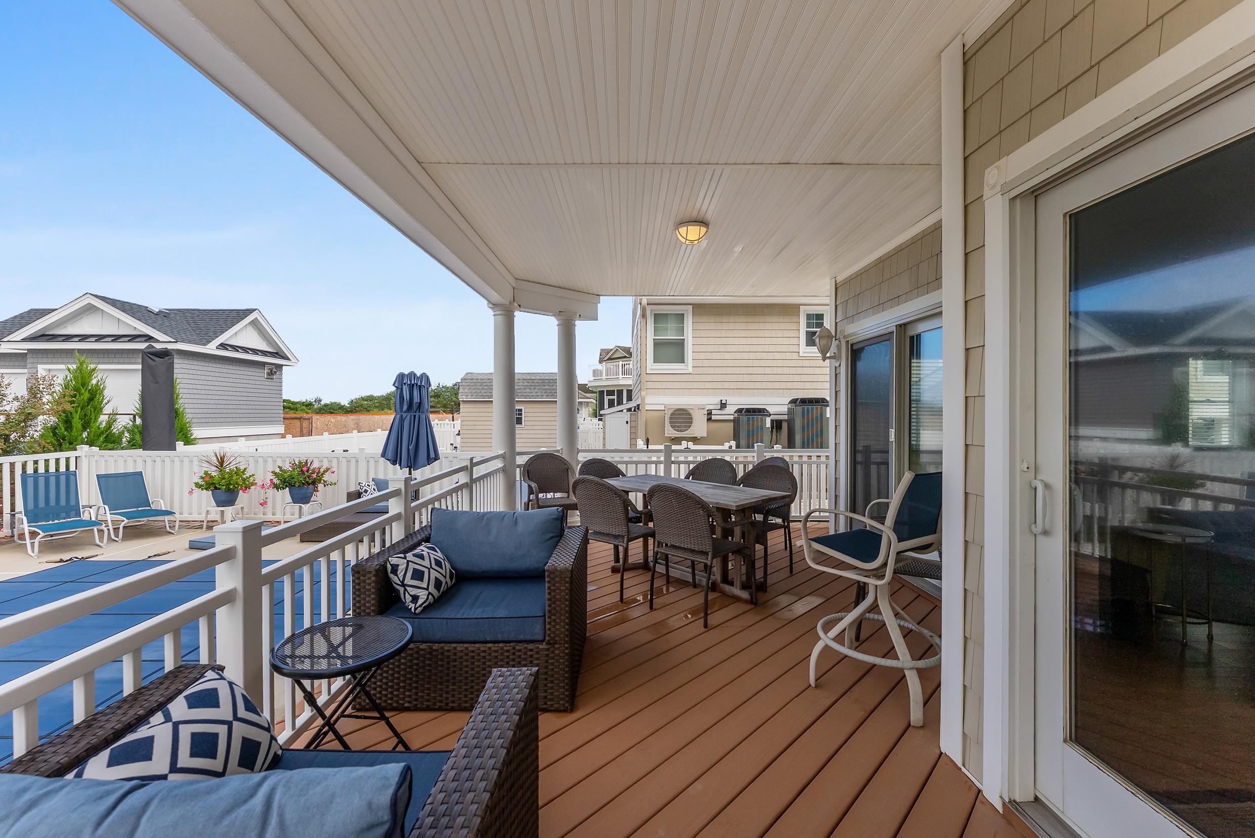 120 113th Street Stone Harbor, NJ 08247 - Photo 27 of 50 a view of a dining room with furniture window and wooden floor