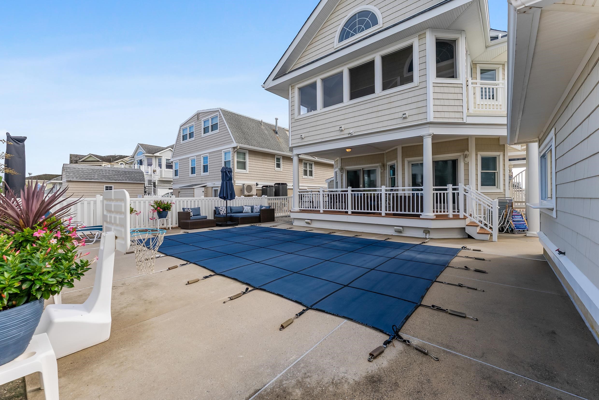 120 113th Street Stone Harbor, NJ 08247 - Photo 32 of 50 a front view of a house with a yard