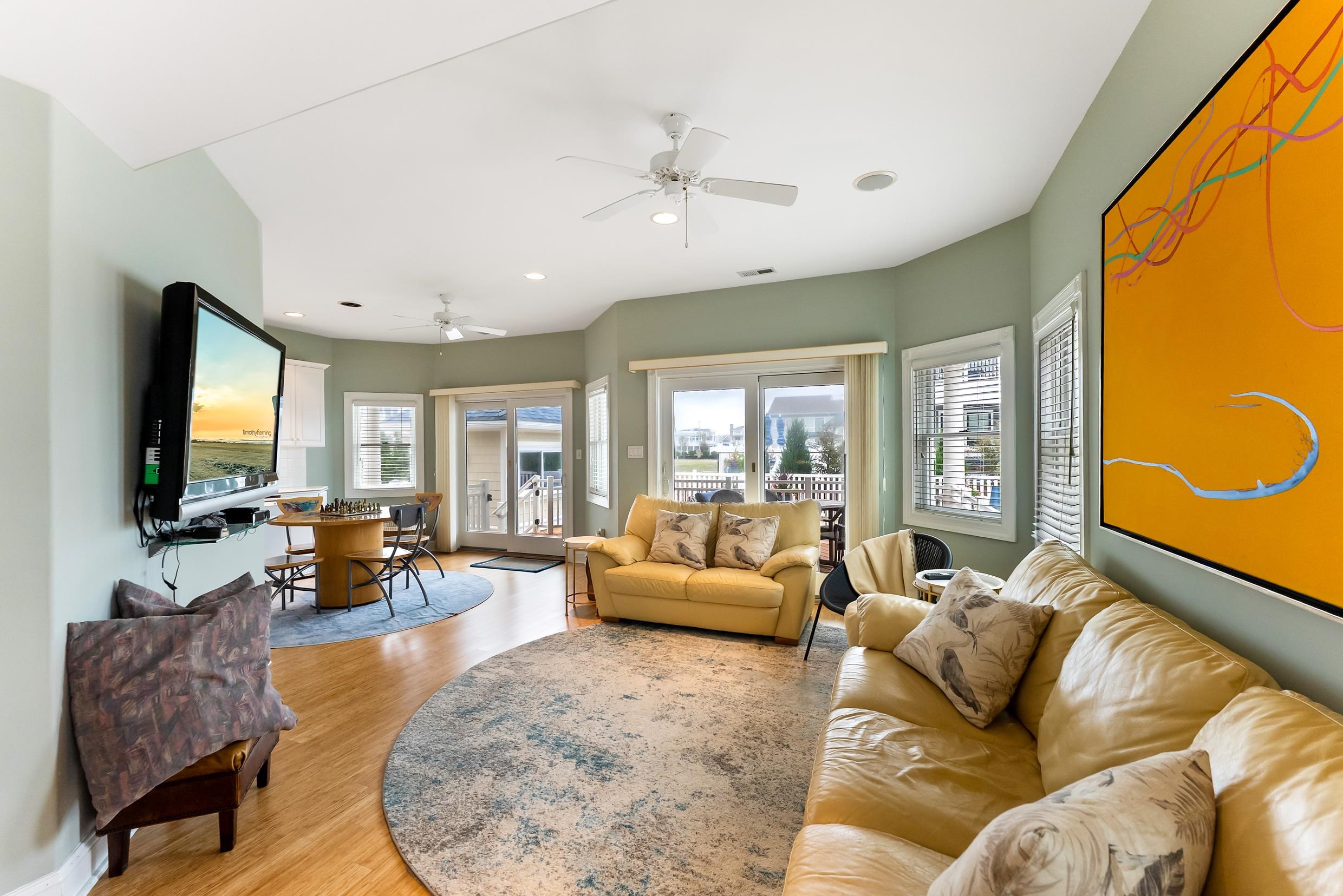 120 113th Street Stone Harbor, NJ 08247 - Photo 35 of 50 a living room with furniture and a flat screen tv
