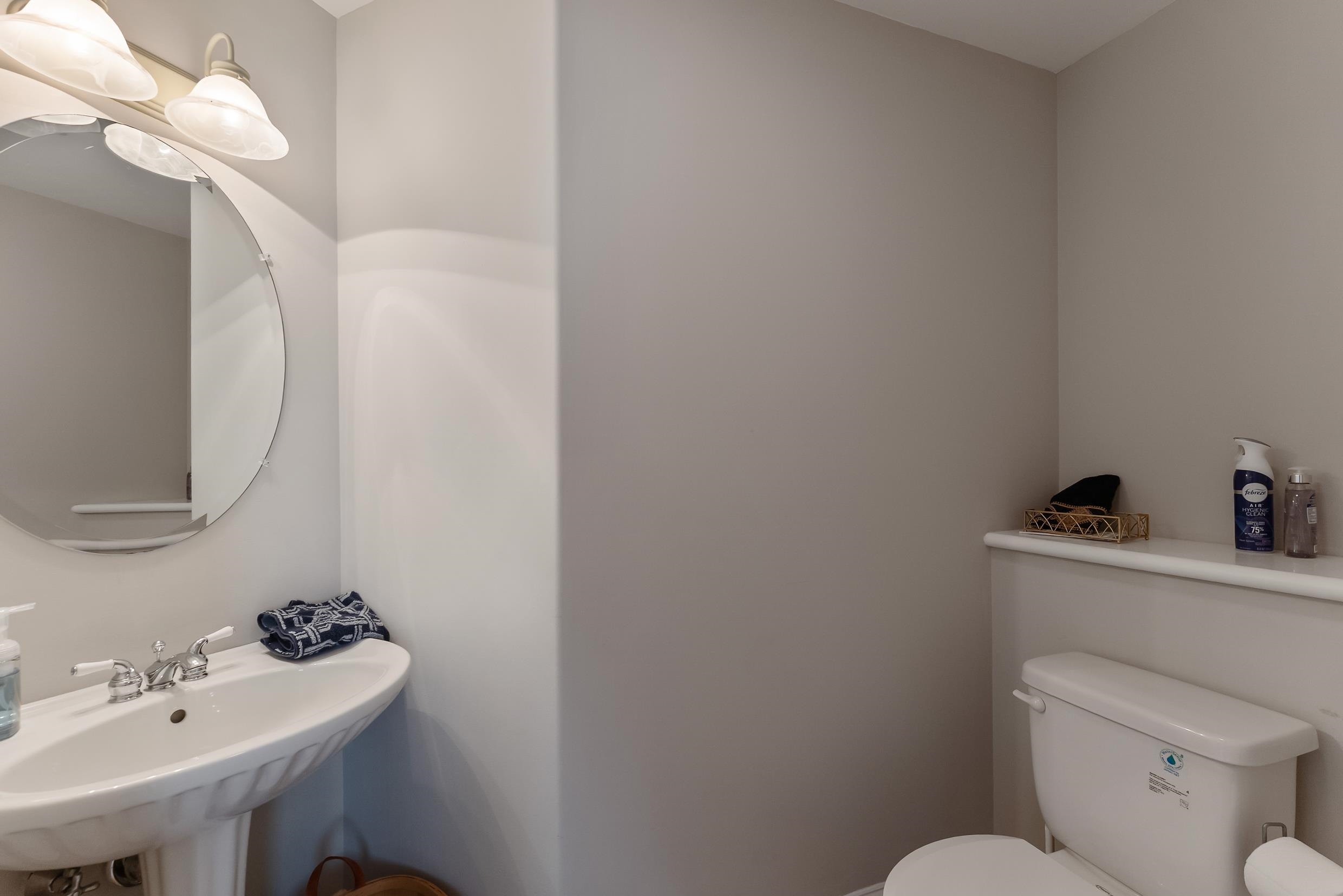 120 113th Street Stone Harbor, NJ 08247 - Photo 36 of 50 a bathroom with a sink mirror and toilet