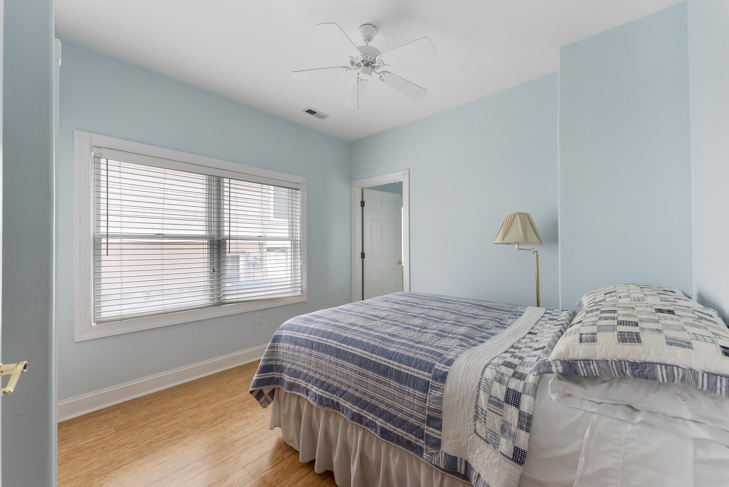 120 113th Street Stone Harbor, NJ 08247 - Photo 37 of 50 a bedroom with a bed and a window