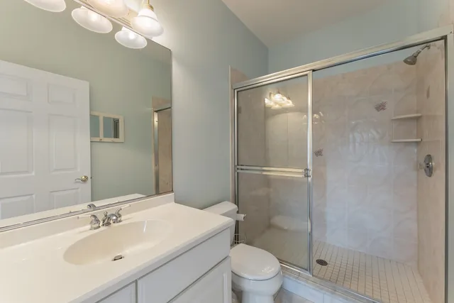 a utility room with sink dryer and washer