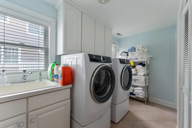 an aerial view of residential building and ocean