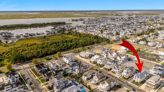 an aerial view of beach and ocean