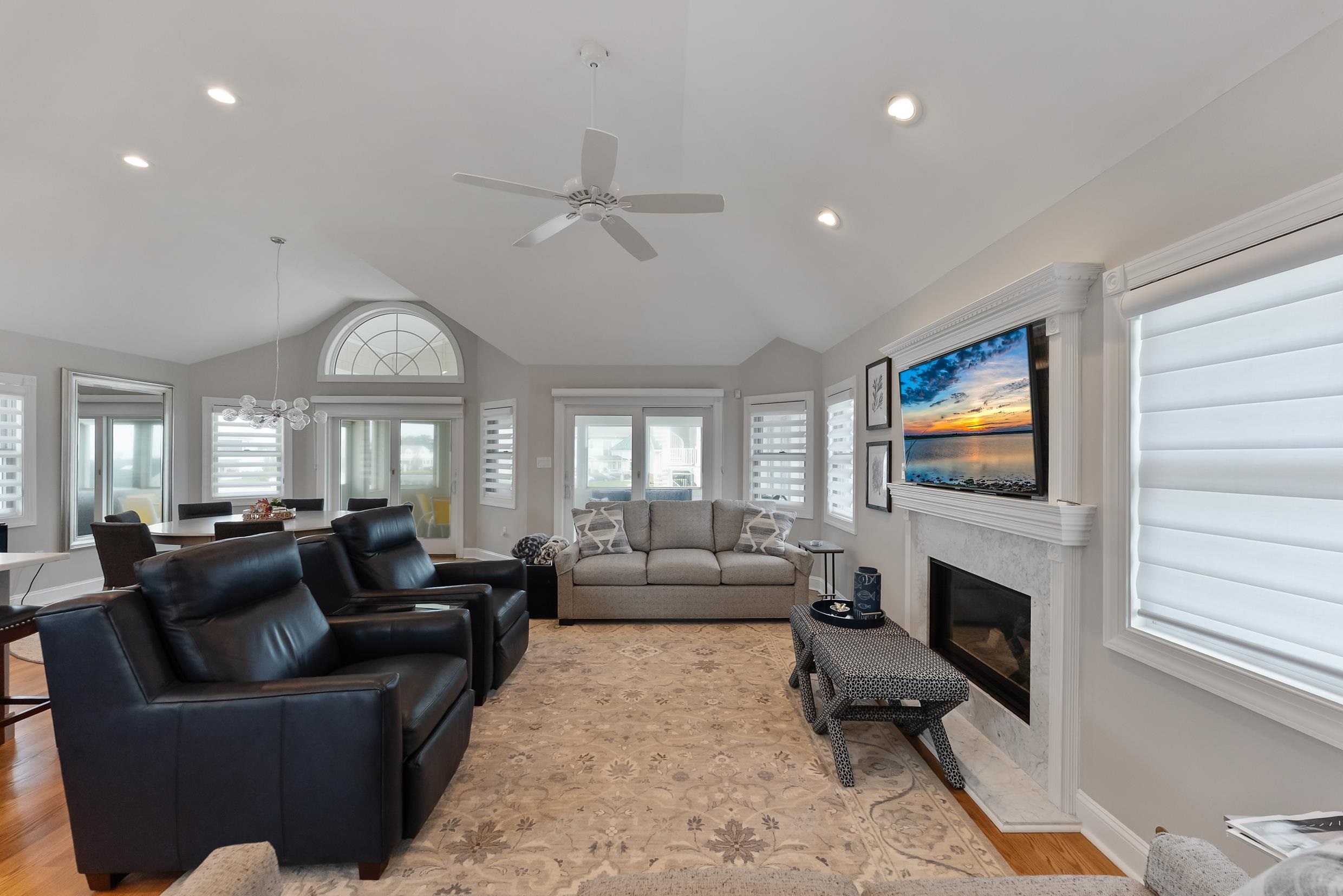 120 113th Street Stone Harbor, NJ 08247 - Photo 7 of 50 a living room with furniture and a fireplace
