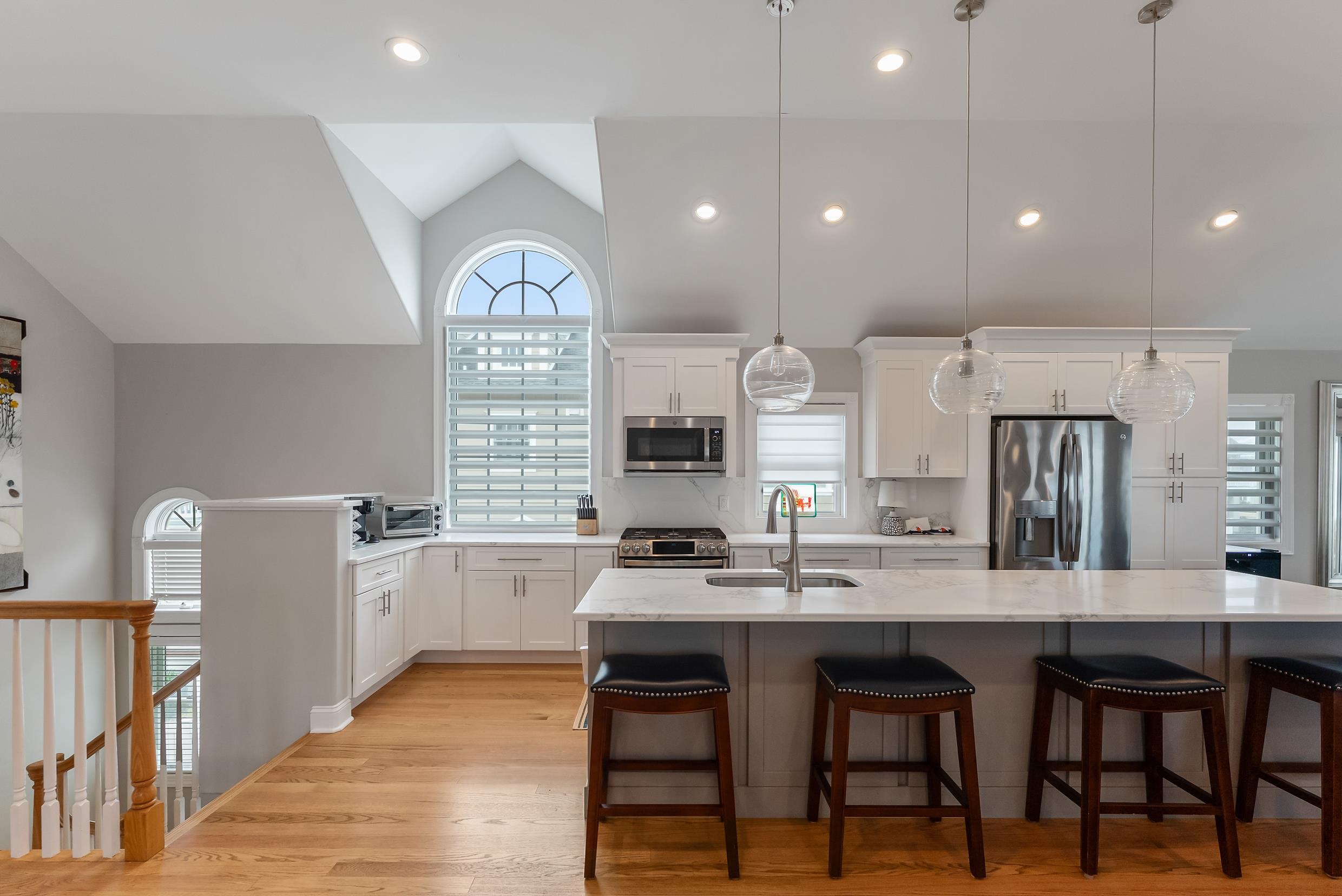 120 113th Street Stone Harbor, NJ 08247 - Photo 8 of 50 a large kitchen with a table and chairs