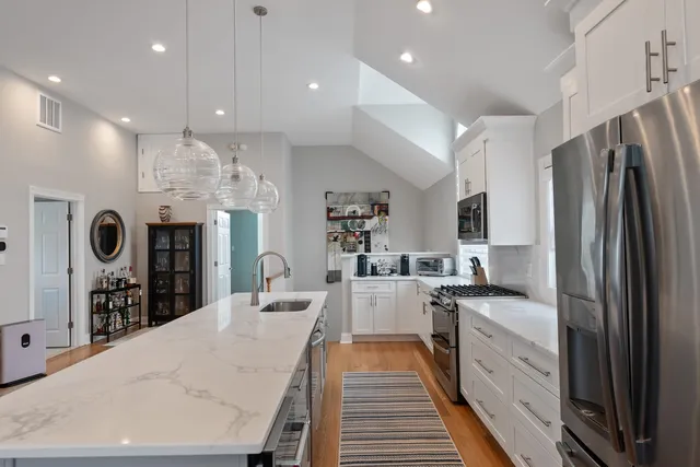 a large kitchen with cabinets