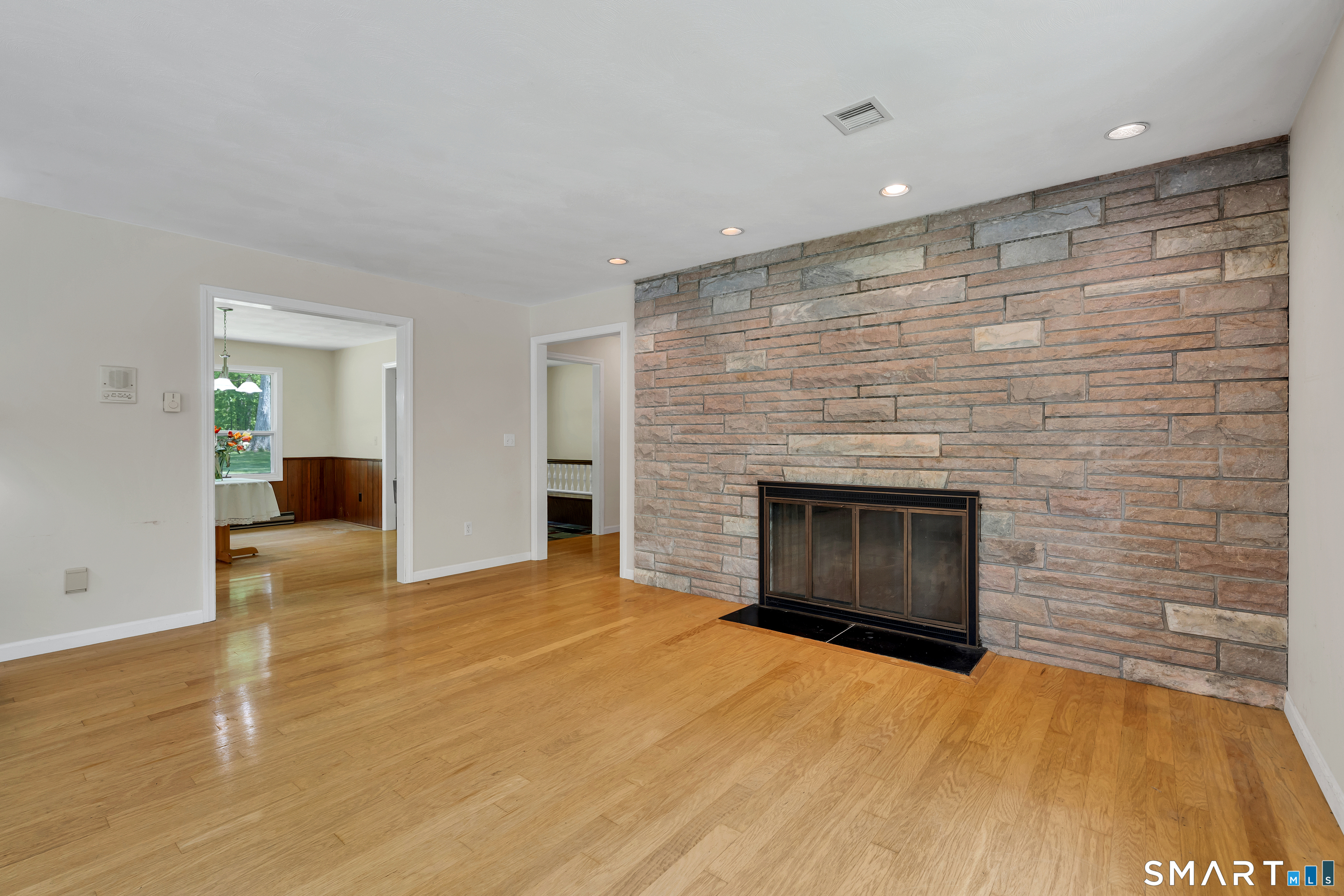 30 Maltbie Road Newtown, CT 06470 - Photo 19 of 40 a view of empty room with a fireplace
