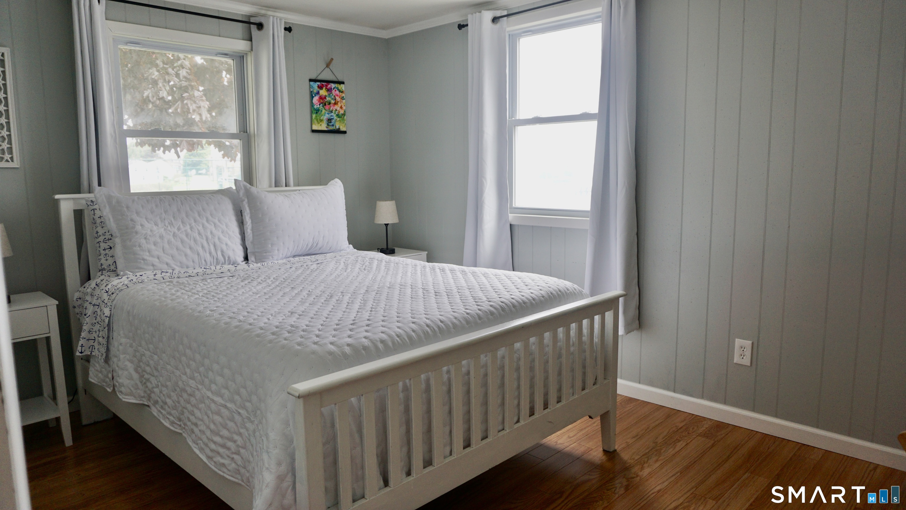 13 Pacific Street Groton, CT 06340 - Photo 25 of 31 a bedroom with a bed and a window