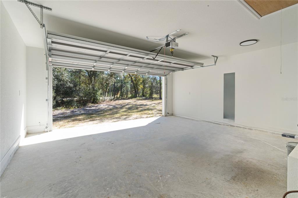 2988 Southwest Bonable Drive Dunnellon, FL 34431 - Photo 11 of 22 a view of empty room with wooden floor and fan