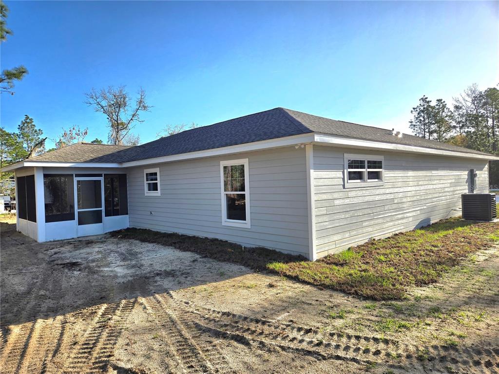 2988 Southwest Bonable Drive Dunnellon, FL 34431 - Photo 20 of 22 a view of a house with a patio