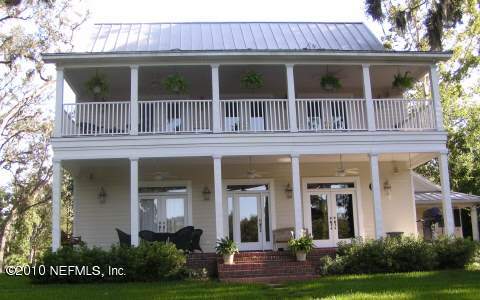 49068 River Bluff Road Hilliard, FL 32046 - Photo 1 of 10 BACK OF HOME OVER LOOKING RIVER