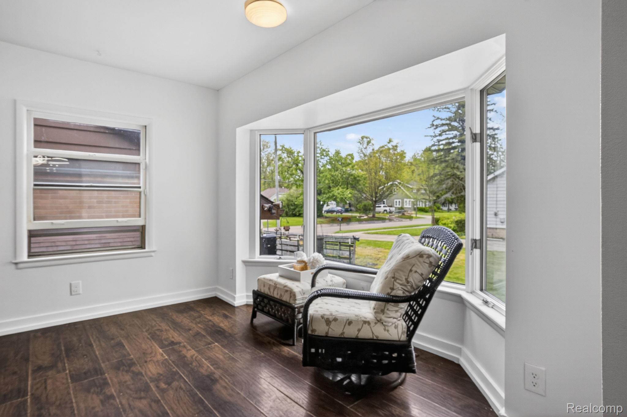 1209 Beatrice Street Flushing, MI 48433 - Photo 11 of 39 Sitting room featuring dark wood finished floors and baseboards