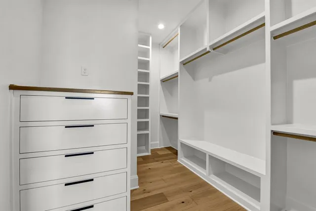 a view of an empty walk in closet