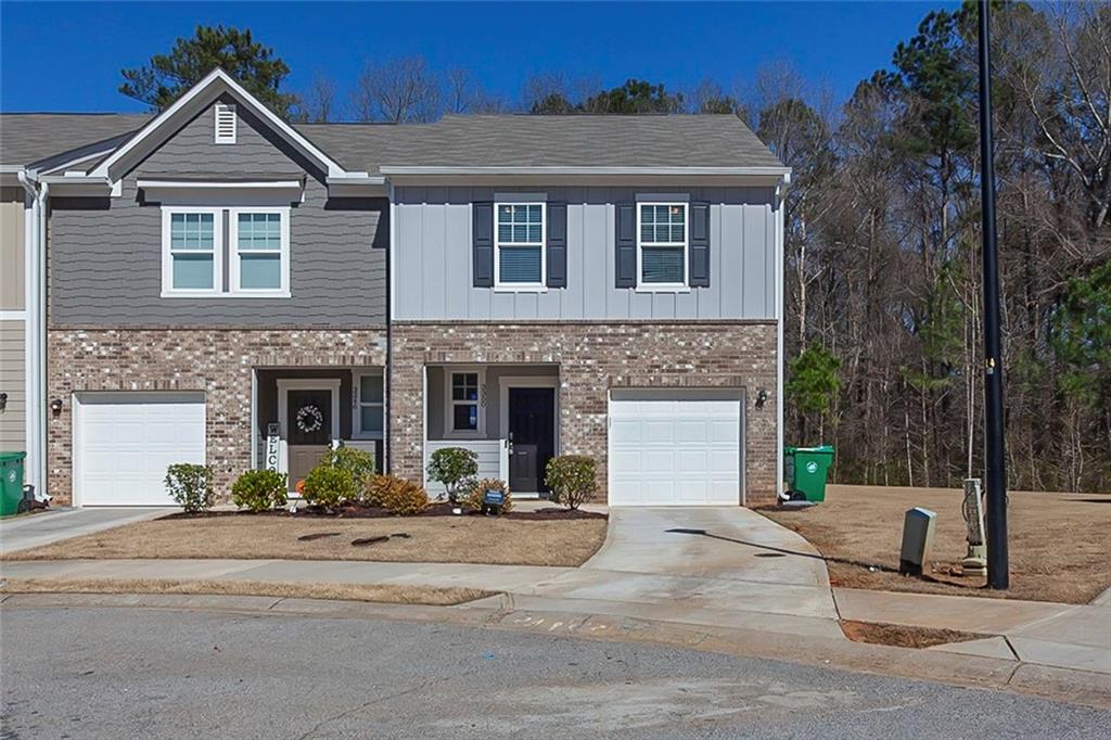 3350 Tarian Way Decatur, GA 30034 - Photo 1 of 1 a front view of a house with a yard and garage