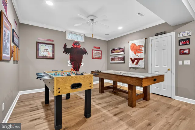 a room with gym equipment and a view of living room