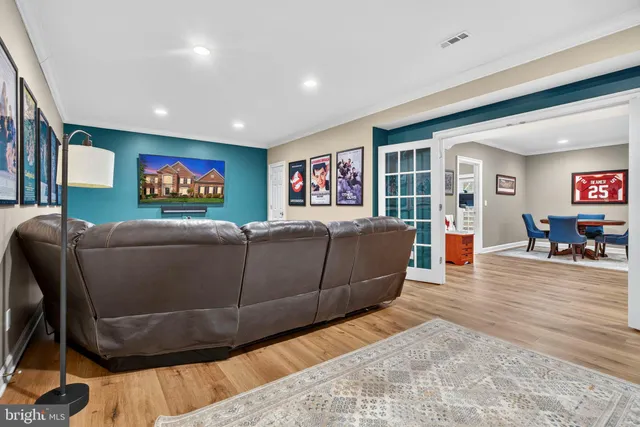 a view of a patio with a table chairs and a yard