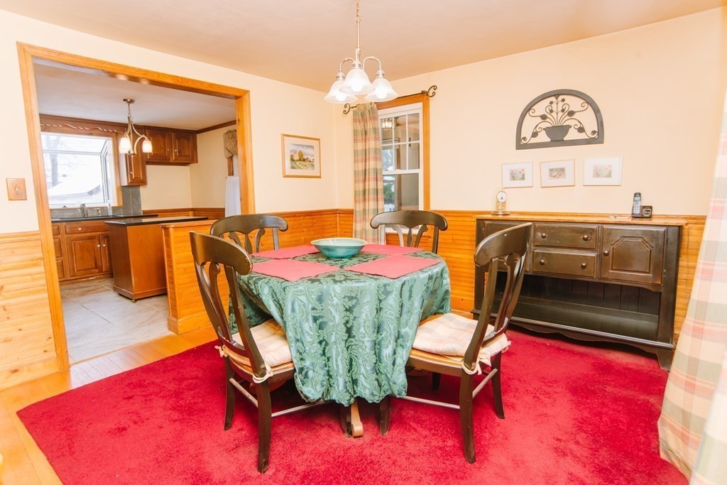 67 Campechi Street Springfield, MA 01104 - Photo 14 of 41 a living room with furniture pool table and a chandelier