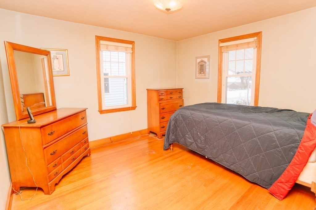 67 Campechi Street Springfield, MA 01104 - Photo 19 of 41 a bedroom with a bed and window