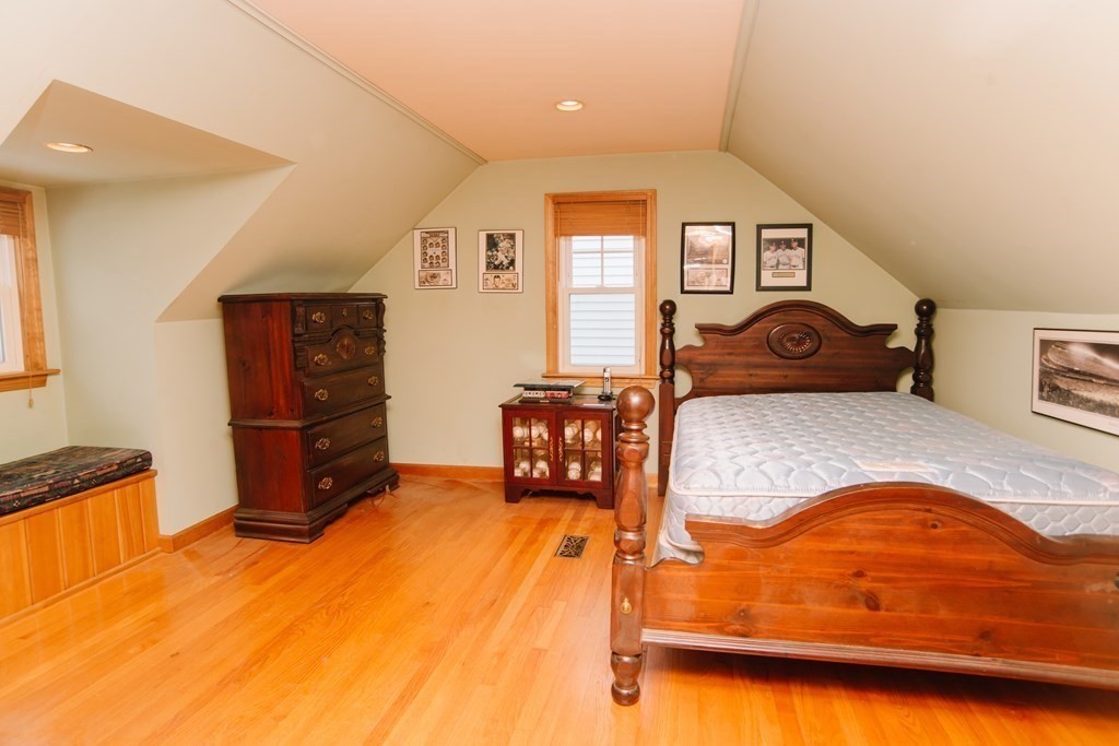 67 Campechi Street Springfield, MA 01104 - Photo 26 of 41 a bedroom with a bed and dresser