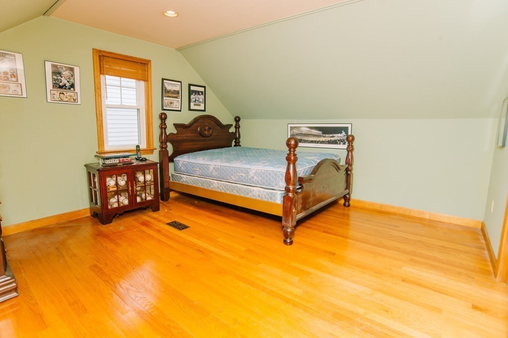 67 Campechi Street Springfield, MA 01104 - Photo 28 of 41 a bedroom with a bed and a window