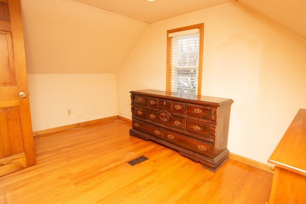 67 Campechi Street Springfield, MA 01104 - Photo 33 of 41 a view of a room with wooden floor