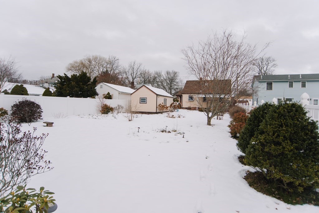 67 Campechi Street Springfield, MA 01104 - Photo 41 of 41 a view of white house with a snow on the road