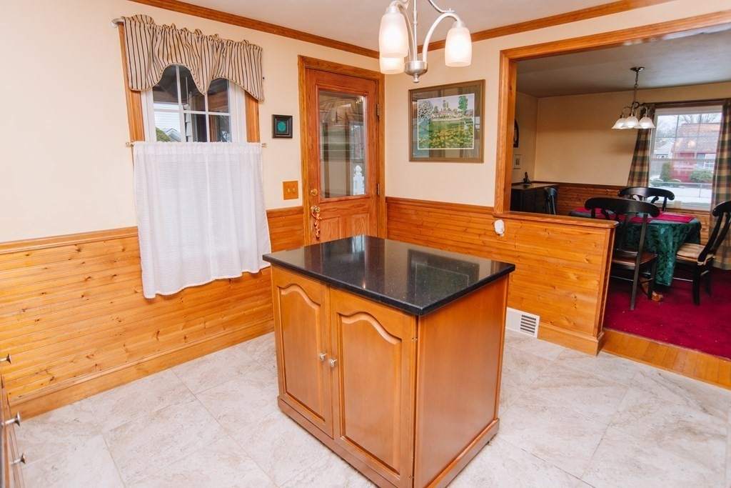 67 Campechi Street Springfield, MA 01104 - Photo 9 of 41 a view of a house with pool table and chairs