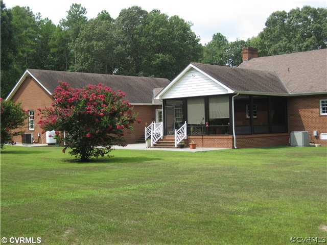 Exterior Back - Rear view showing Florida room, pa