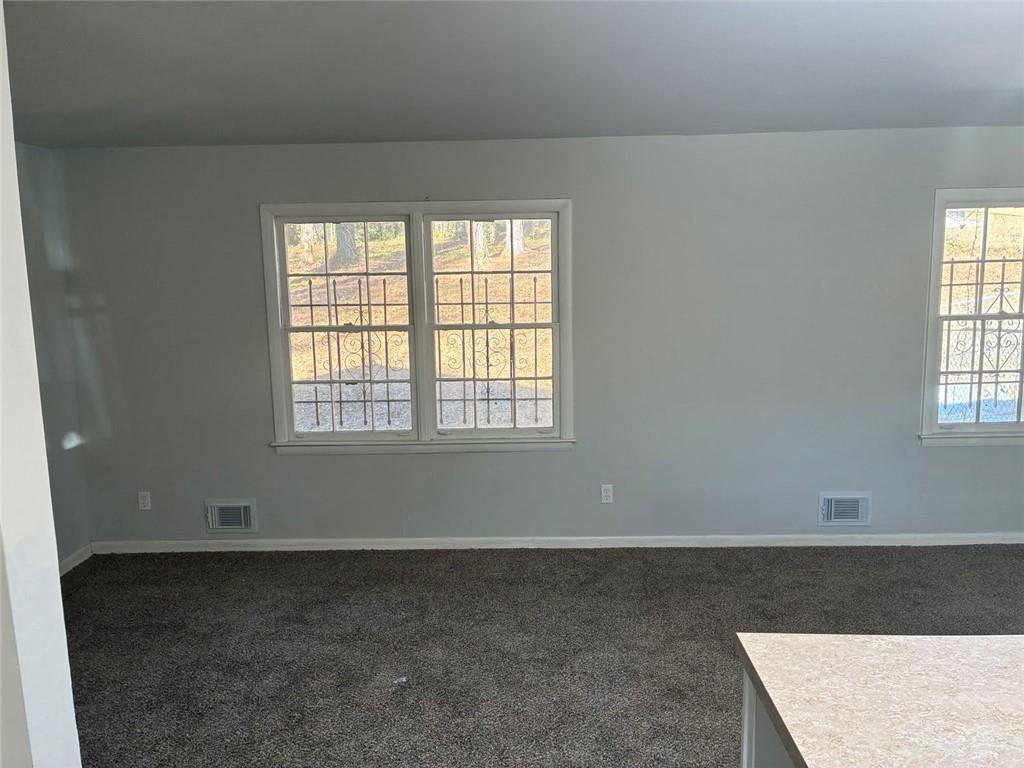 3992 Maplewood Drive Decatur, GA 30035 - Photo 12 of 44 an empty room with windows