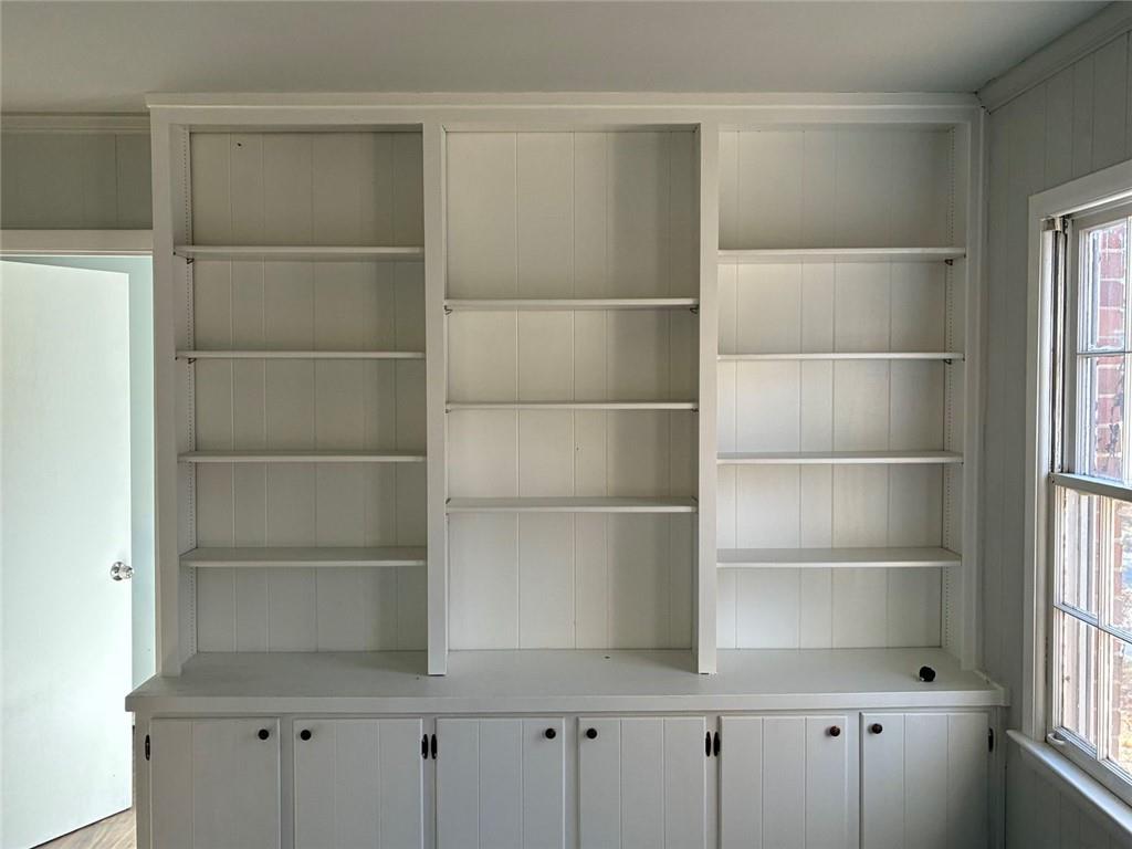3992 Maplewood Drive Decatur, GA 30035 - Photo 25 of 44 a view of a room with shelves on the wall